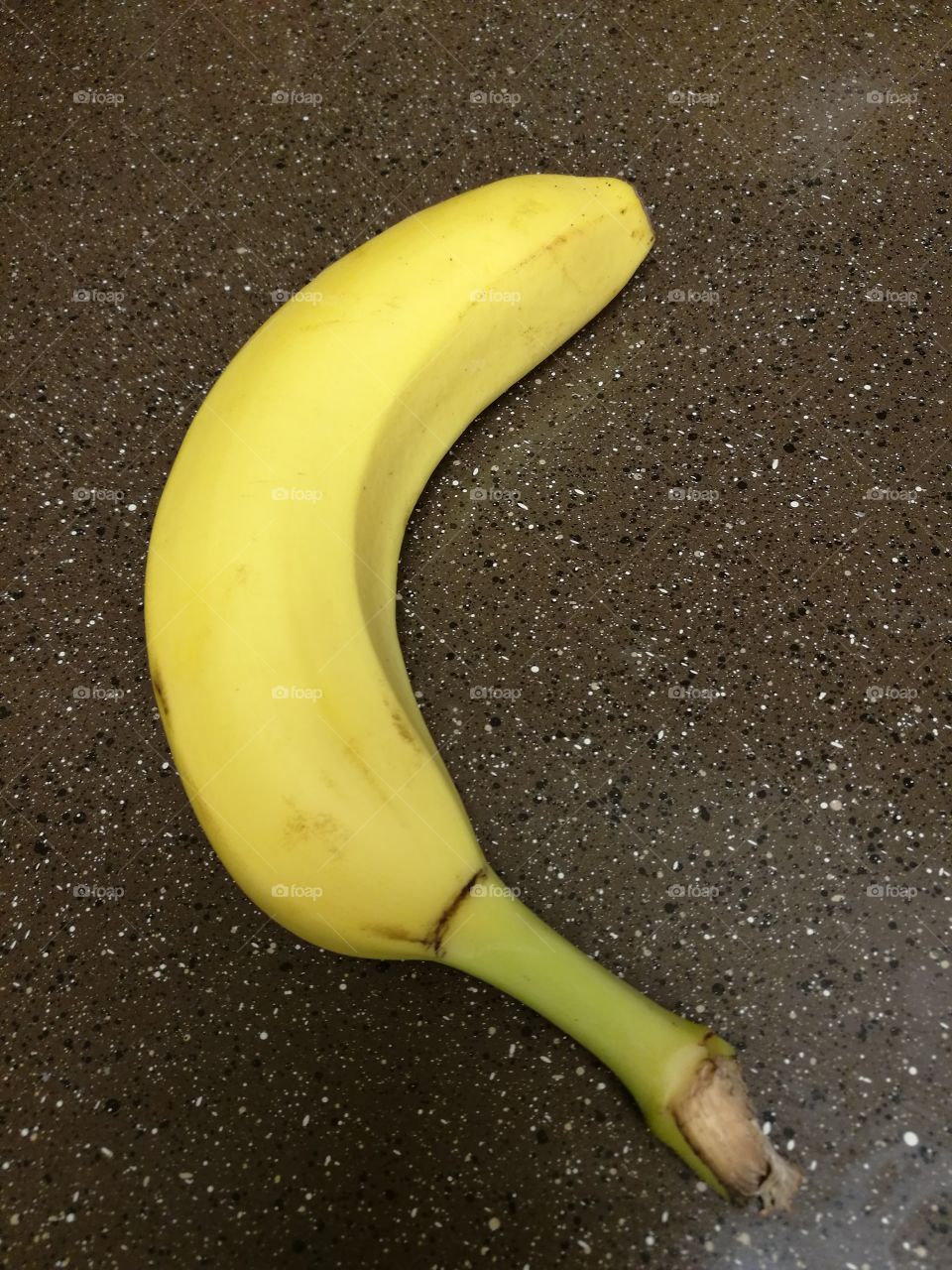 Ripe banana on counter