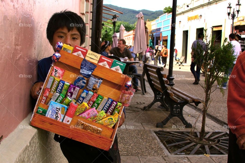 Indigenous Mexican kid working to help support his familly, Chiapas Mexico.