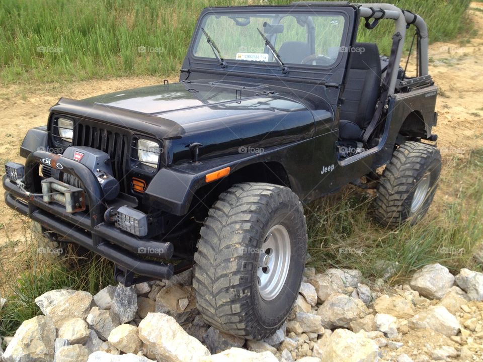 Crawling from the front. 1995 Jeep Wrangler (lifted) doing some rock crawling near Christiansburg, VA