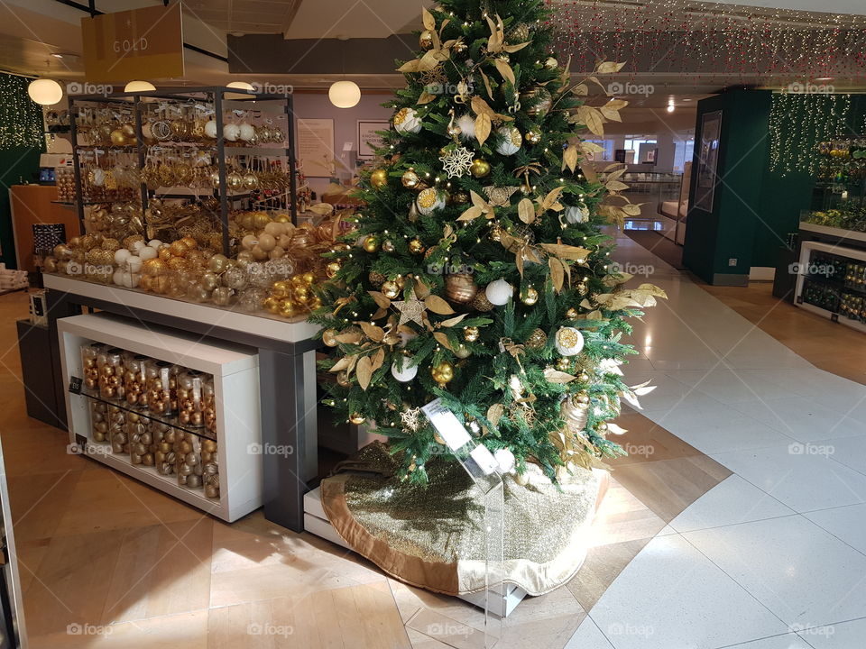Christmas decorations gold and green at Peter Jones department store Sloane square Chelsea Kings road London