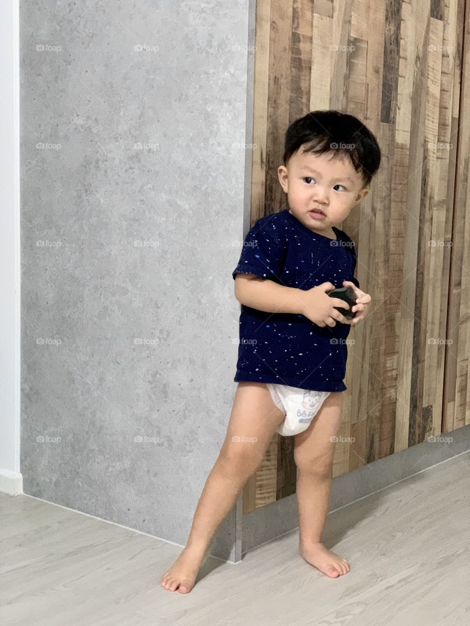 Asian kid model king with tee shirt and nappy