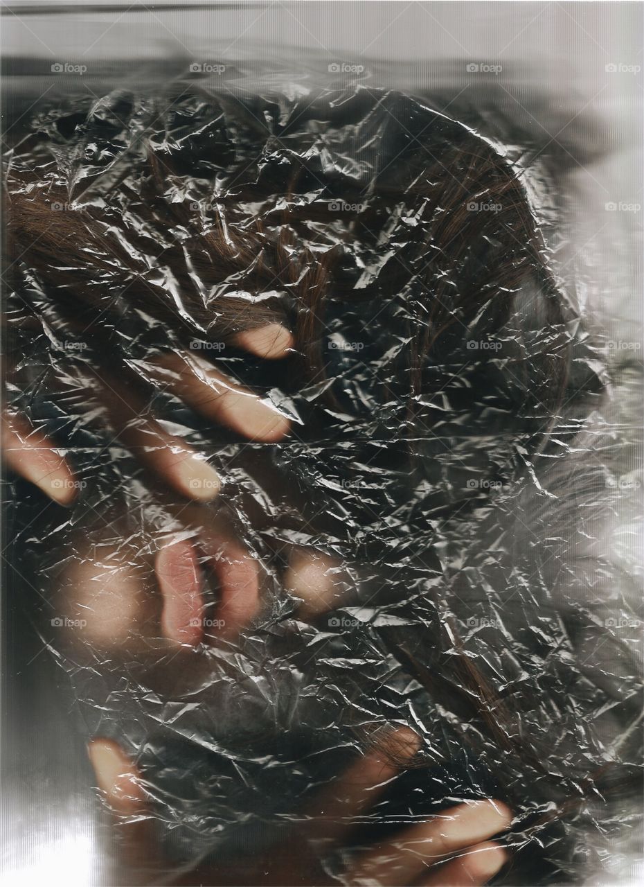 man in a plastic bag