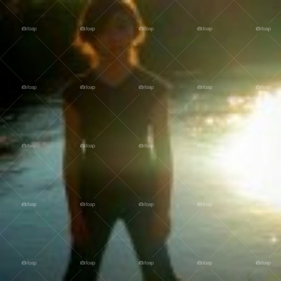 girl in front of river