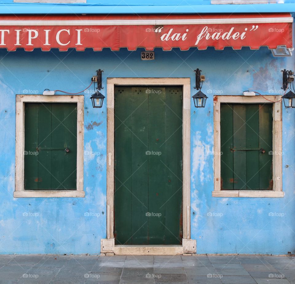 colored house with symmetrical windows