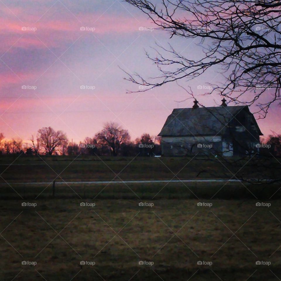 sunrise with a beautiful old barn