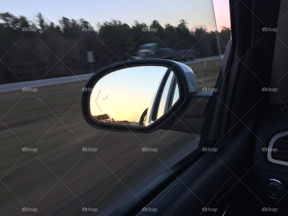 Rear view mirror sunset