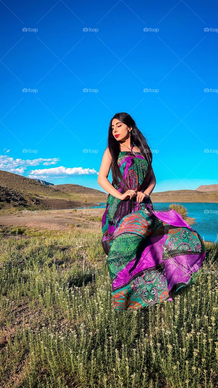 girl in nature with colorfull dress