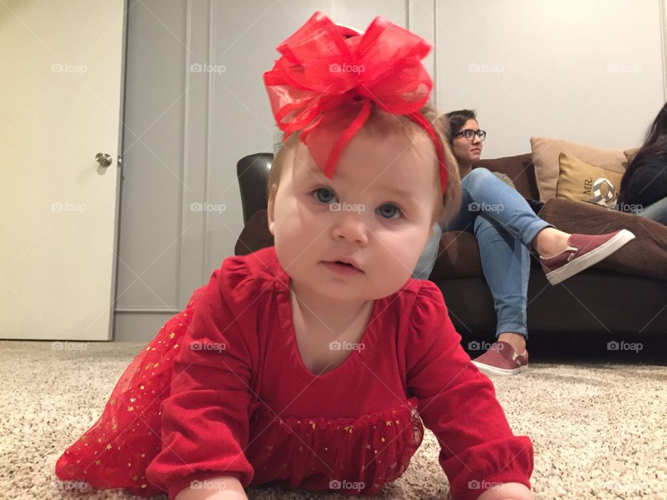 Baby girl in red bow 3