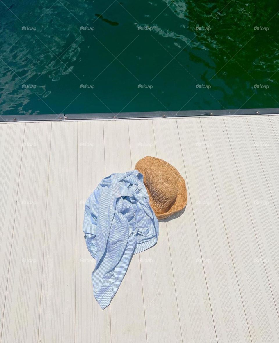 beach things lie on the pier