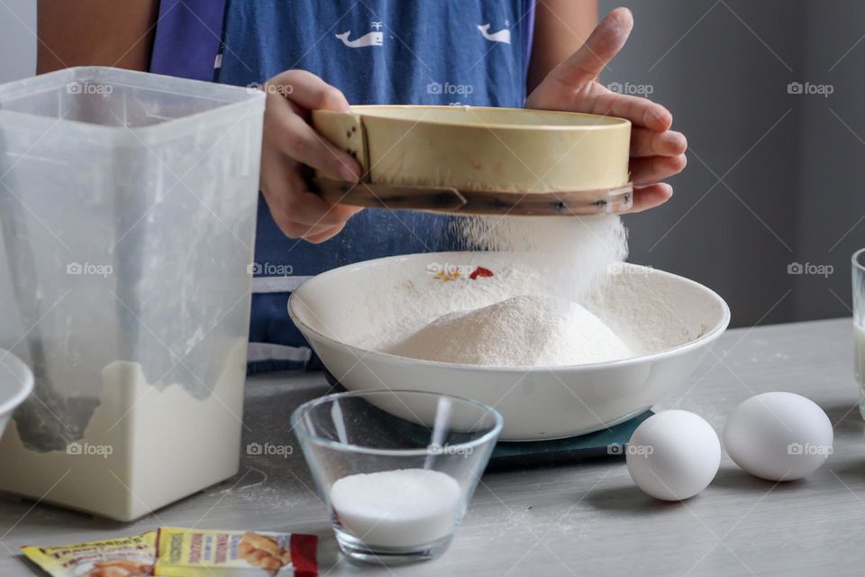 Sifting flour for a dough