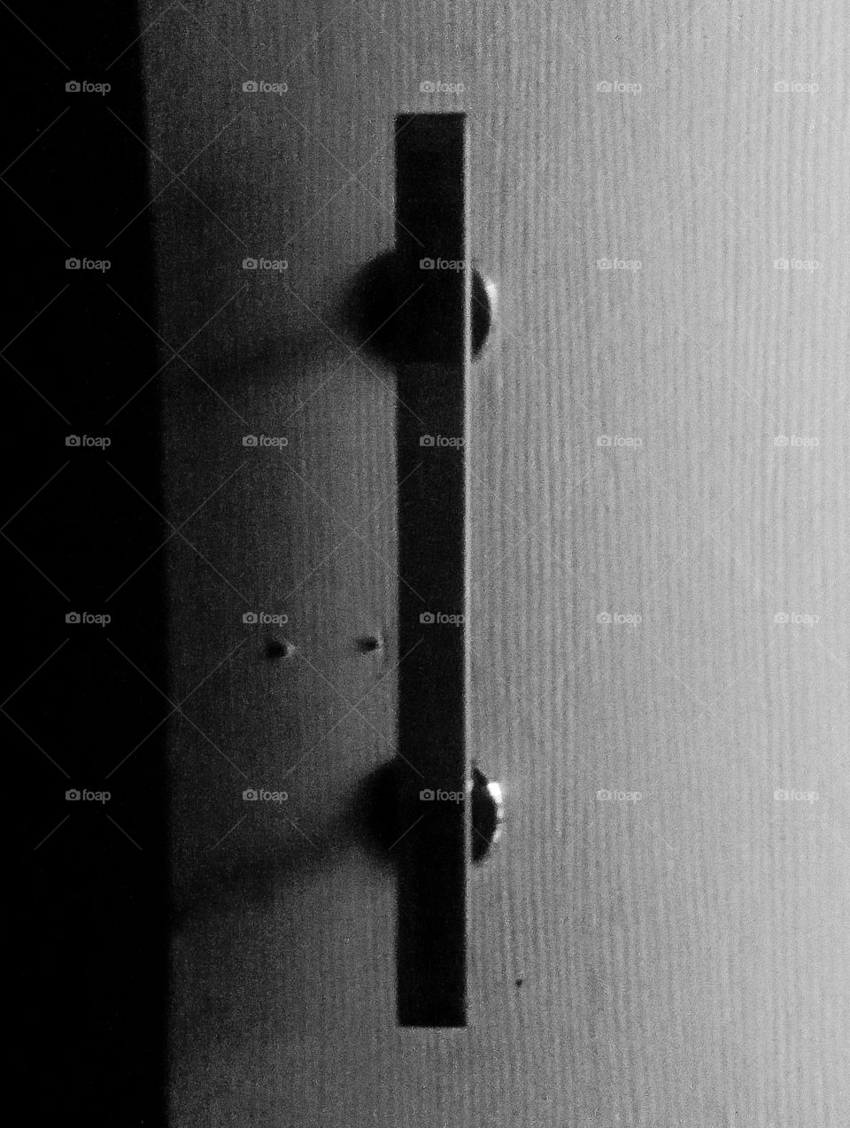 Door handles in black and white and noise editions