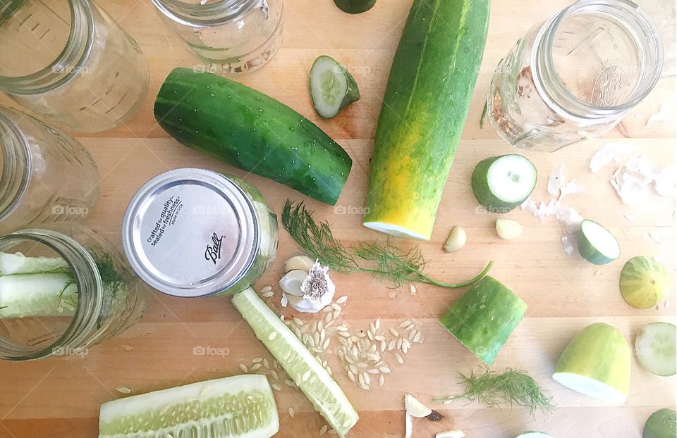 Prepping to can dill pickles with garden fresh cucumbers.