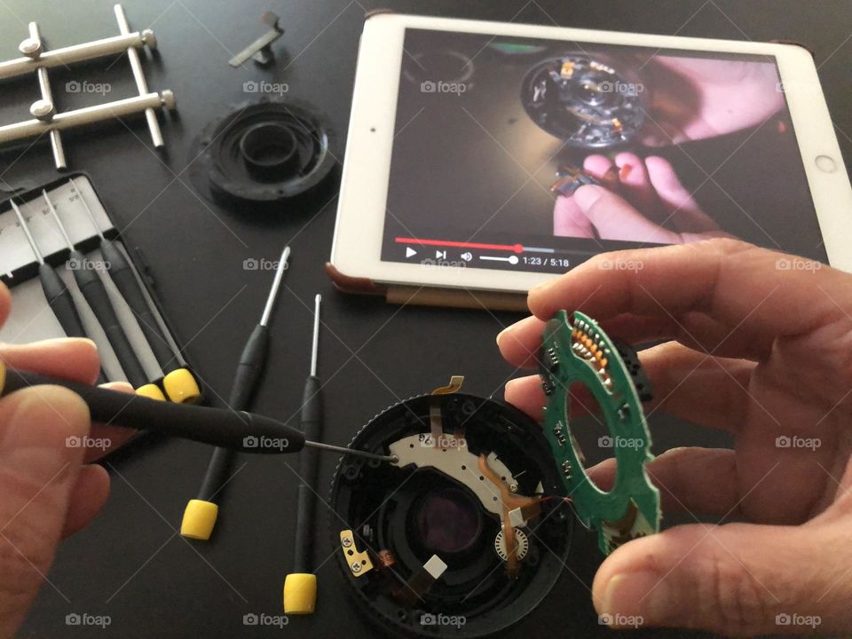 Photography Enthusiast DIY lens cleaning and repair
