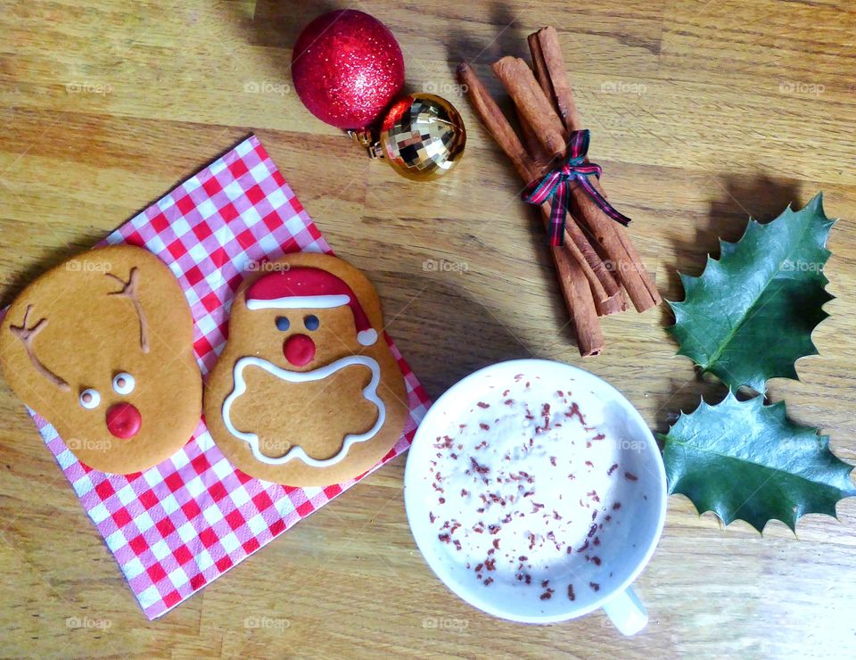 Christmas coffee with cookies and cinnamon