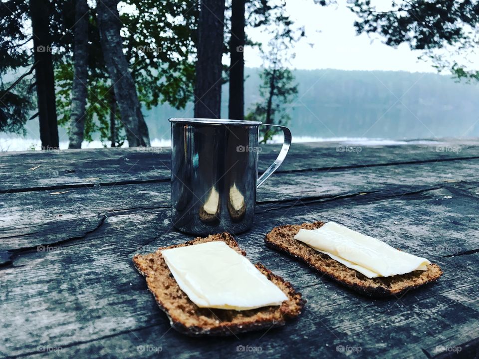 After a Night out camping a simple ryebread with cheese and a cup of Coffee 
