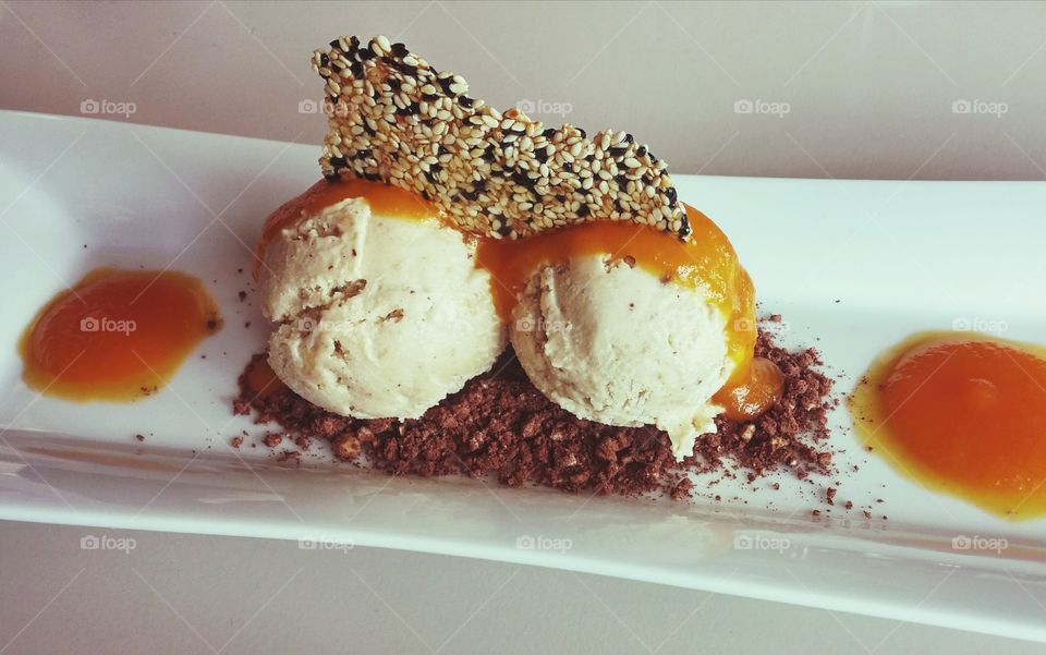 Garnished ice creams on plate