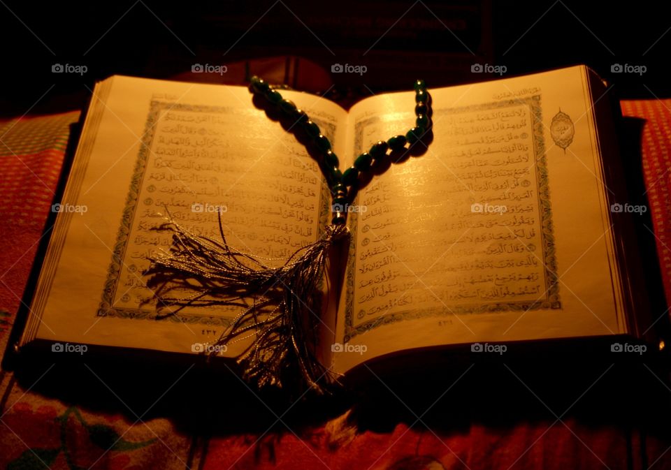 Holy Quran in candle light 