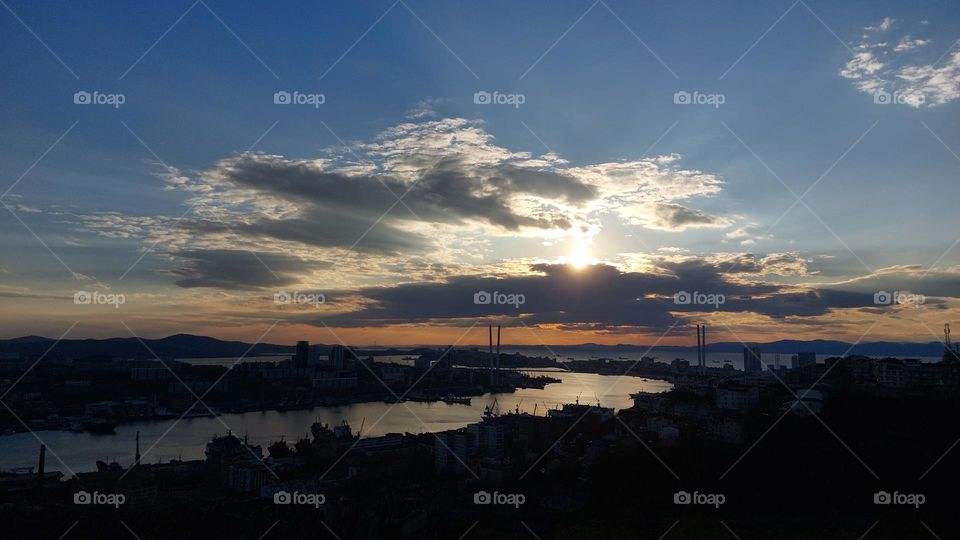 an amazing view on the city and the bridge in the evening