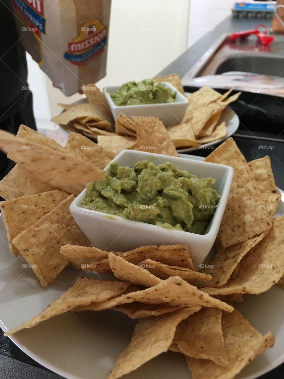 Spinach hummus dip and corn chips