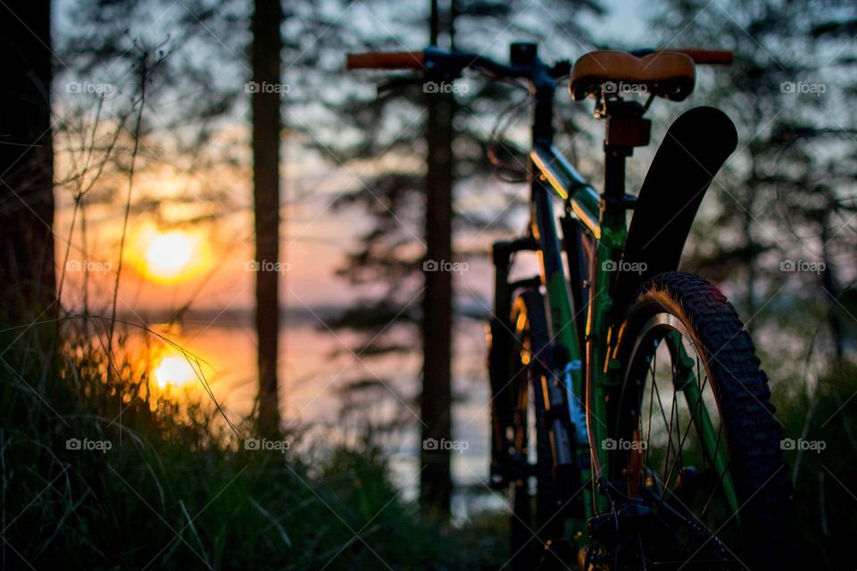 evening biking. sunset and bike