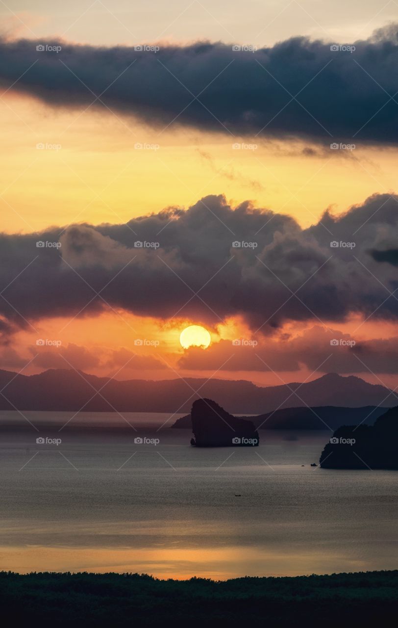 Beautiful dawn above cute island