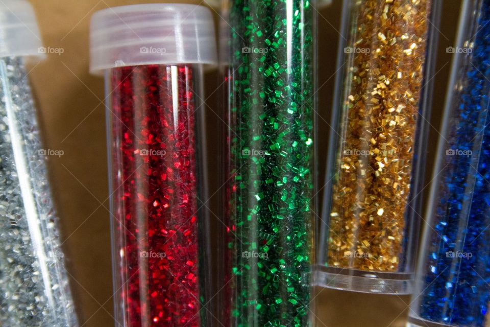 Tubes of colorful glitter