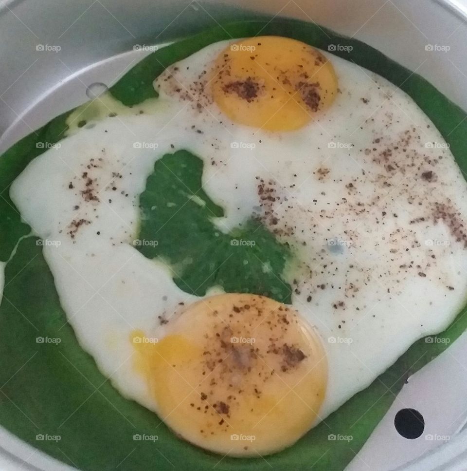 Two eggs on a lotus leaf