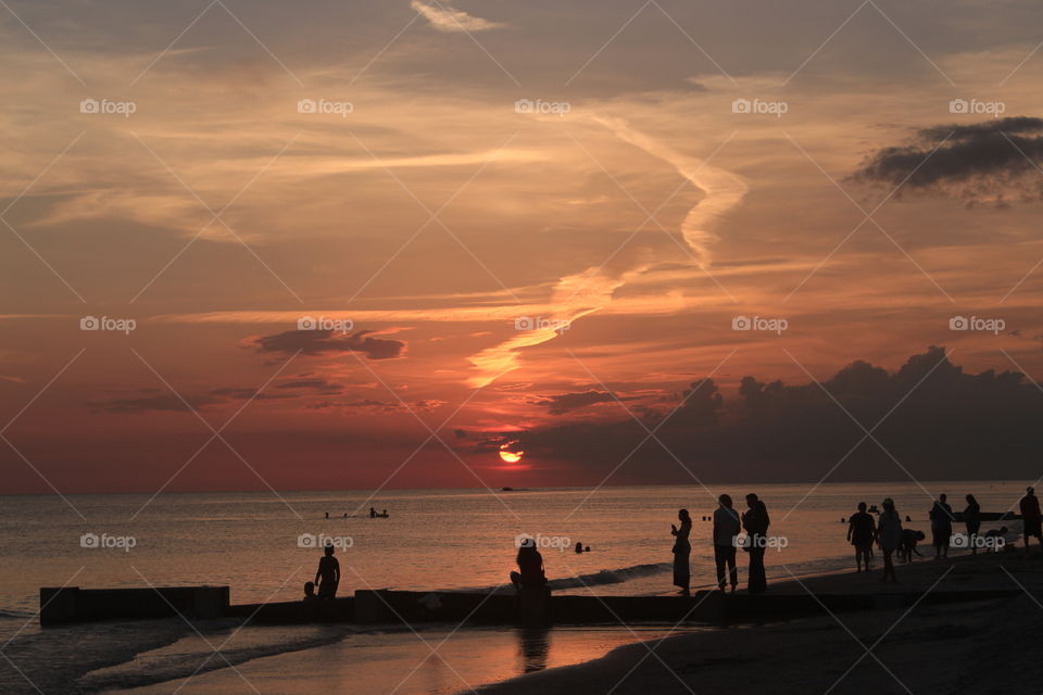 Silhouette of people on beach