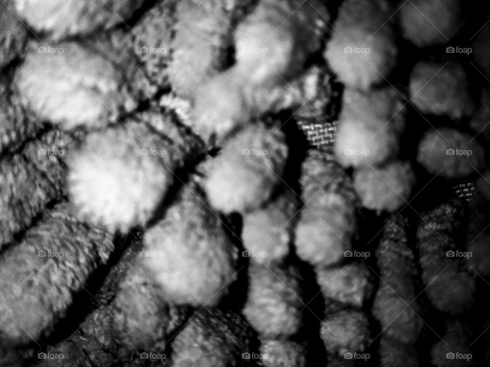 close up of carpet fibers. in grey