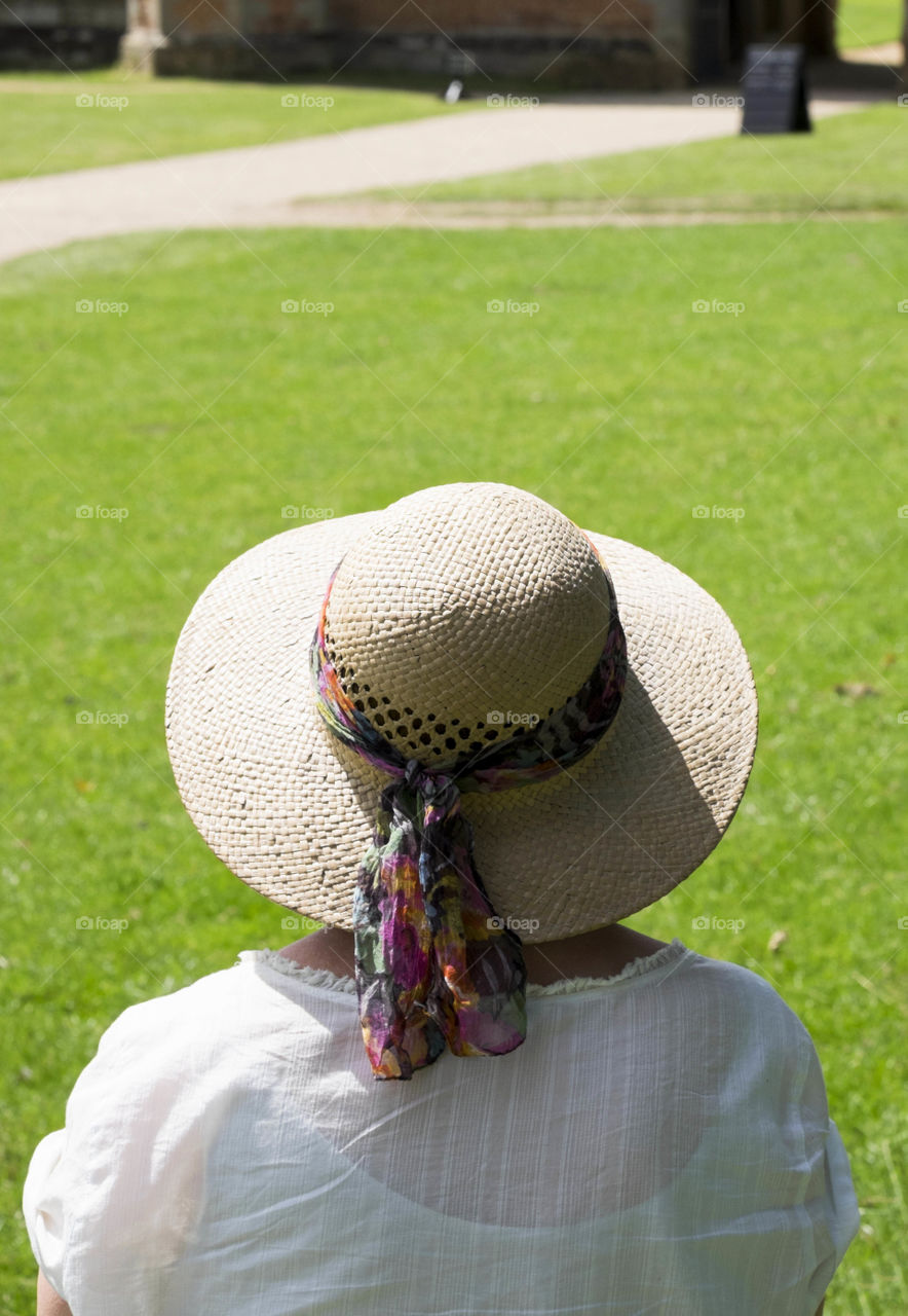 Woman. Straw hat