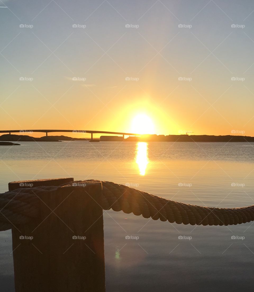 Bridge over calm sea