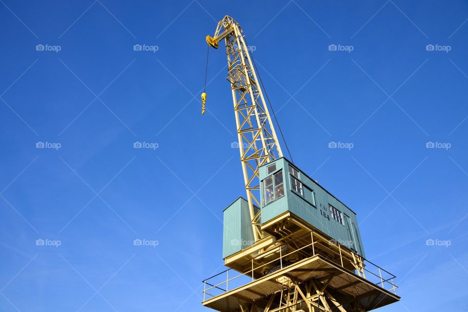 Old crane on the quay in Antwerp