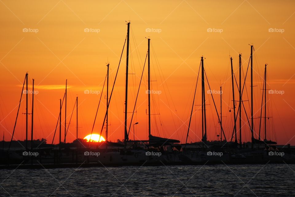 Sailboats in sunset 