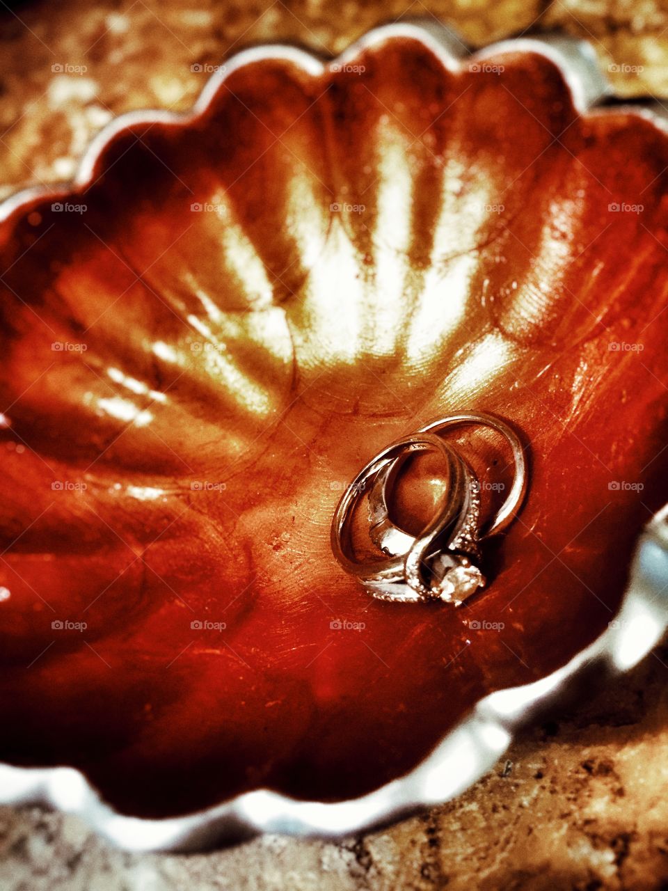 Wedding Rings. Wedding rings sitting in a dish