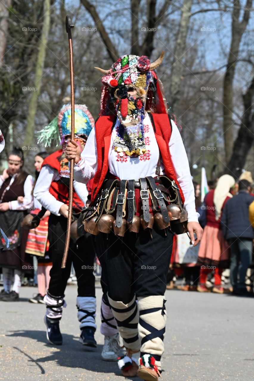 Kukeri are elaborately costumed Bulgarian man, who perform traditional rituals intended to scare away evil spirits. Until recently, all Kukeri were man, but now we can also see women 🙂