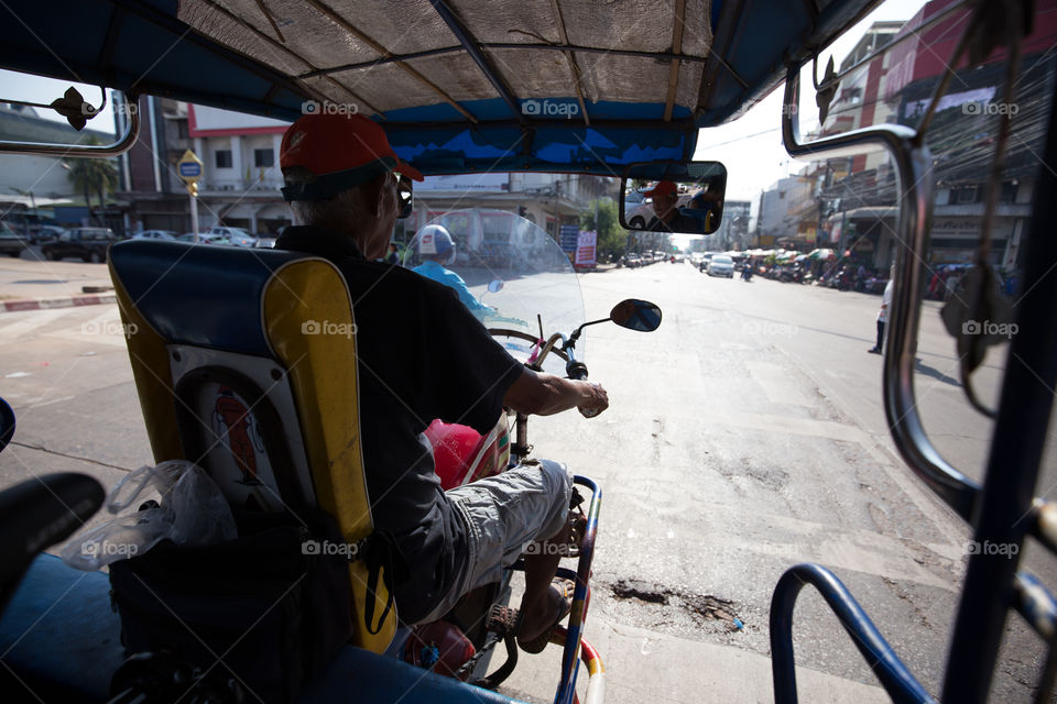 Riding the tuk tuk taxi in Thailand 