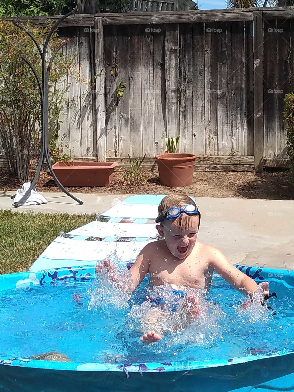 My nephew and I having a great day in the sun today and it's amazing how you can find  baby pools to be very refreshing when you're burning up from the heat!!!😎🤗🤪