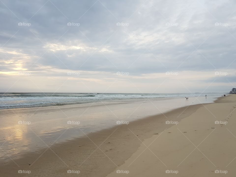 Low tide at the beach before the rains begin