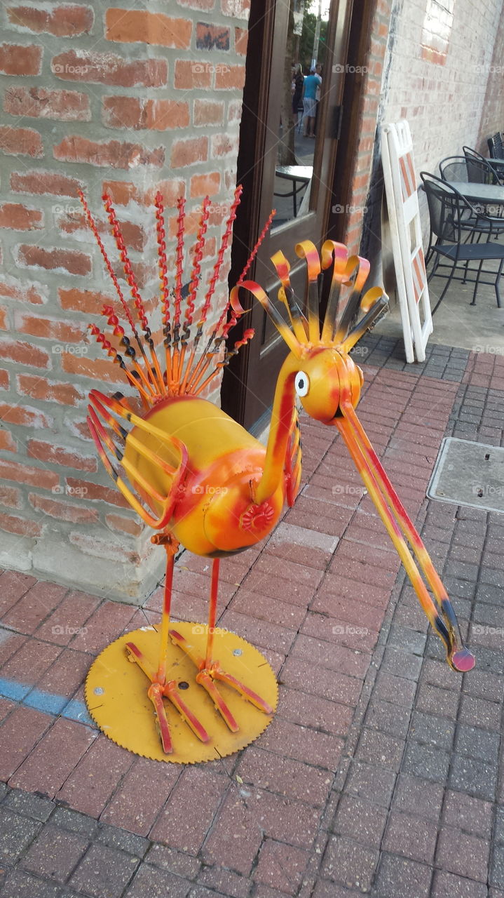 JIVE TURKEY!  This Fall bird graces a corner in the rejuvenated art district of Downtown Alexandria, Louisiana. It's is a metal sculpture made from pieces of tools welded together. The paint pallette is fall colors.