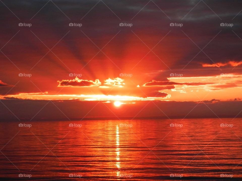 A golden sunrise over the Atlantic Ocean. 