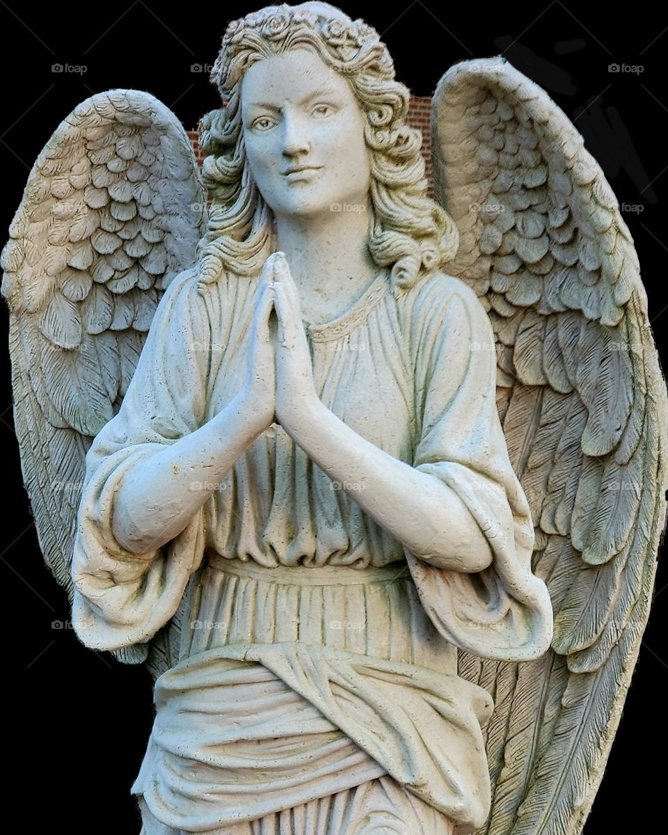 concrete statue in someone's front yard