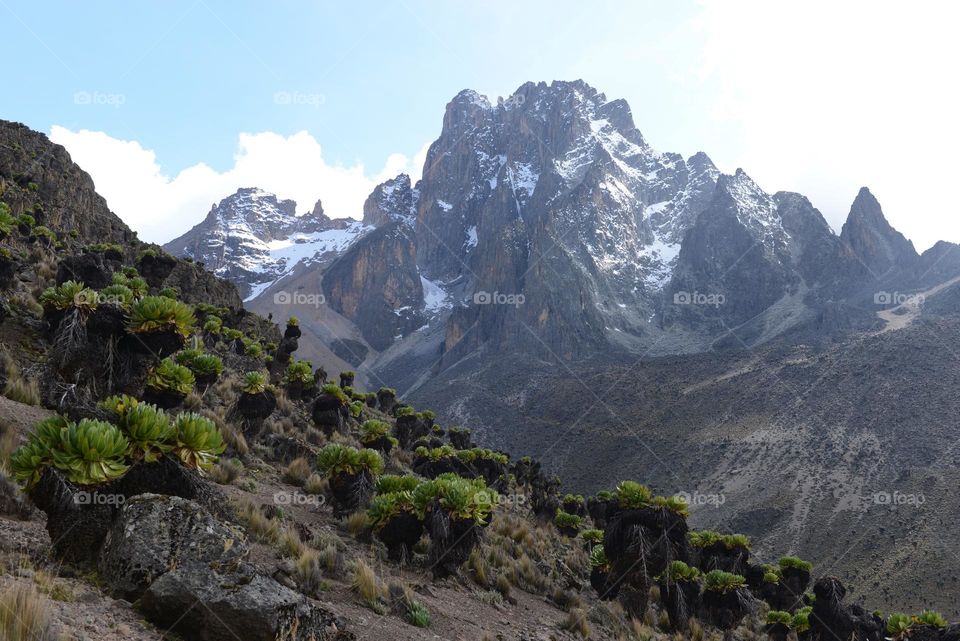 mountain mountain range scenics - nature environment landscape beauty in Nature sky Nature snow adventure Rock mountain peak Travel wilderness travel destinations Land cold temperature Hiking Cloud activity