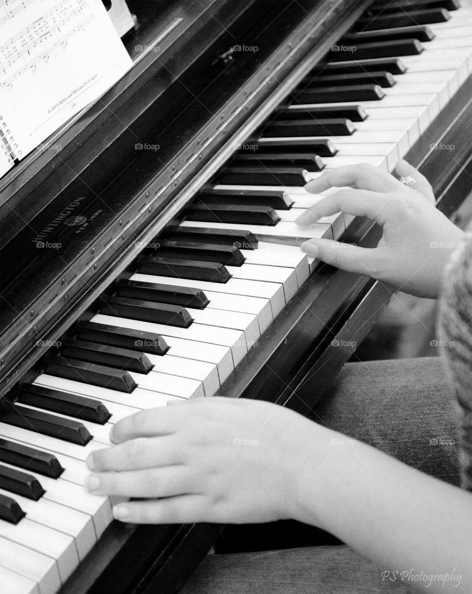 tickling the ivories. playing the piano