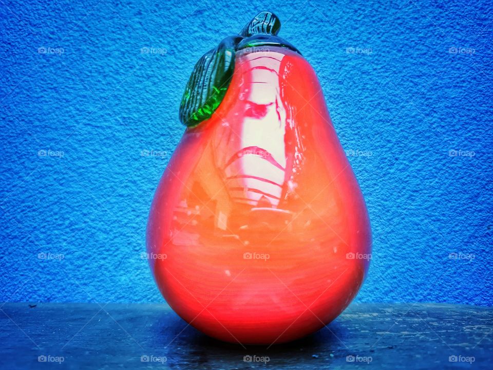 pear on the blue wall