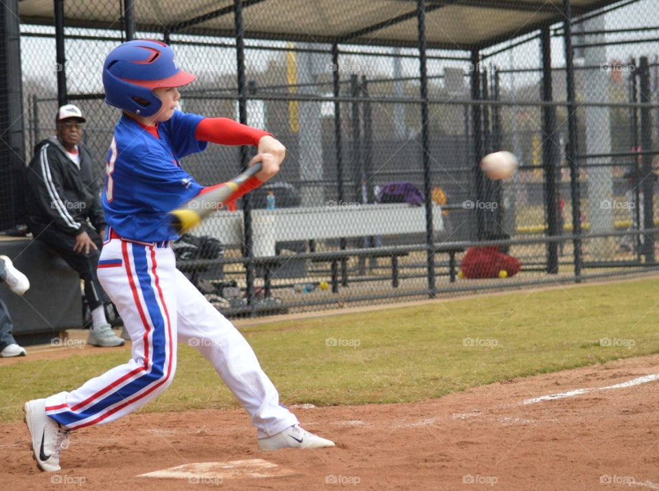 10 year old baseball player. 10 year old baseball player smashing the ball!