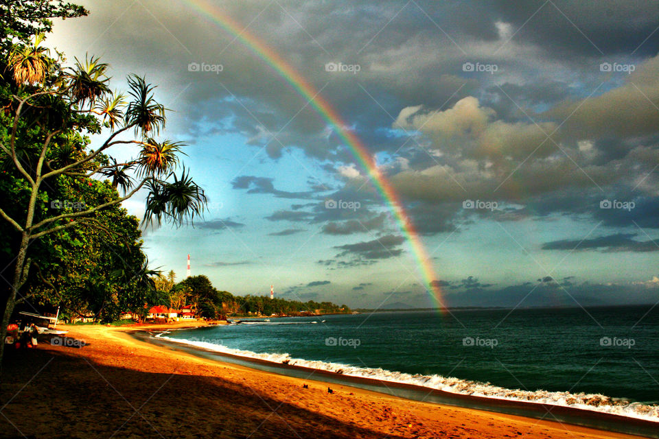 Rainbows above the water