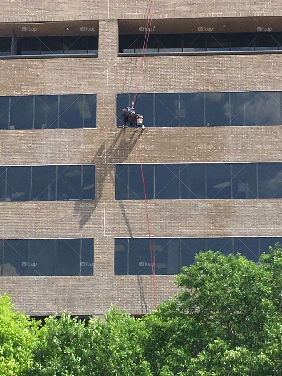 My hats off to anyone who swings from the roof of a building and cleans the windows, especially in 100 degree weather 