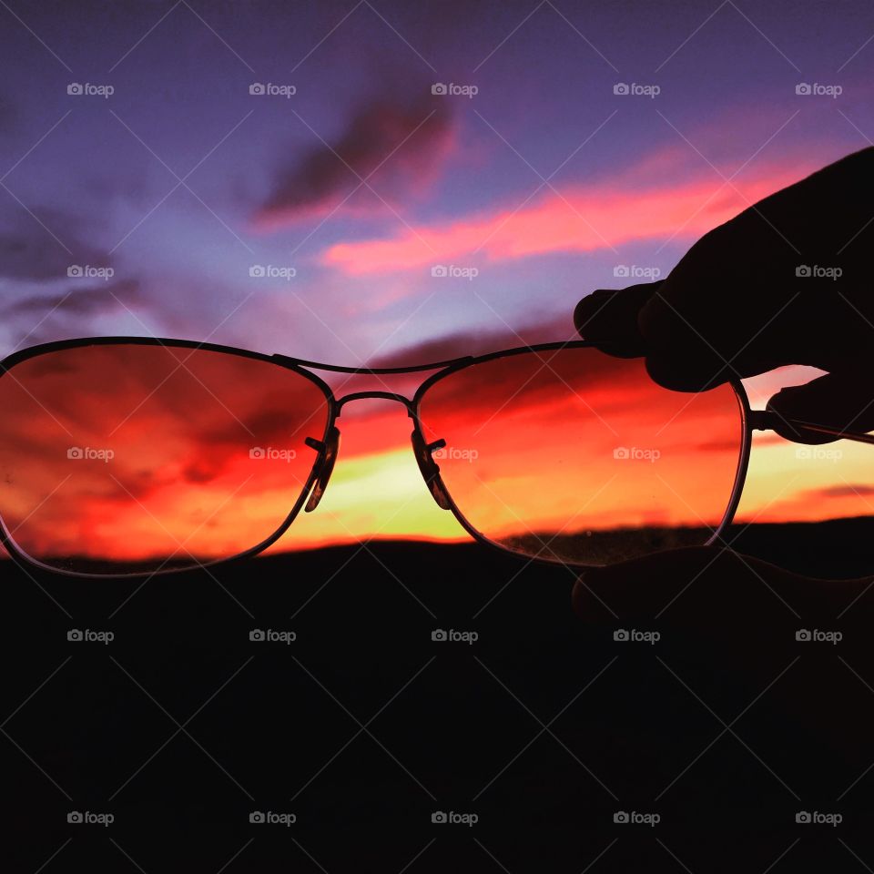 Seeing the setting of light. Look this photo of my sunglasses looking out into the sun 