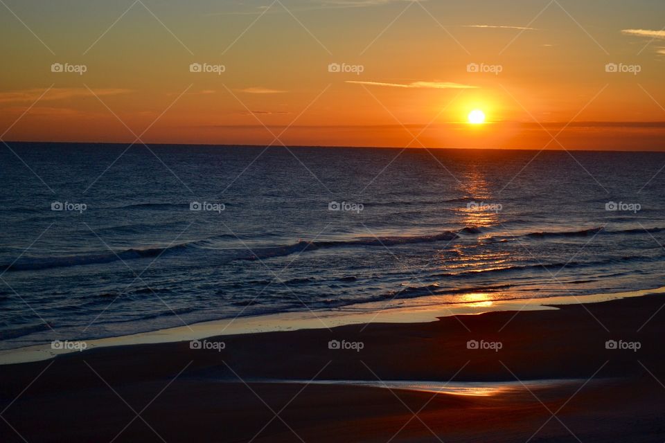 Winter Sunset On Beach