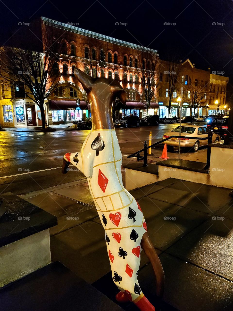 A unique dog statue in front of a hotel in New York state